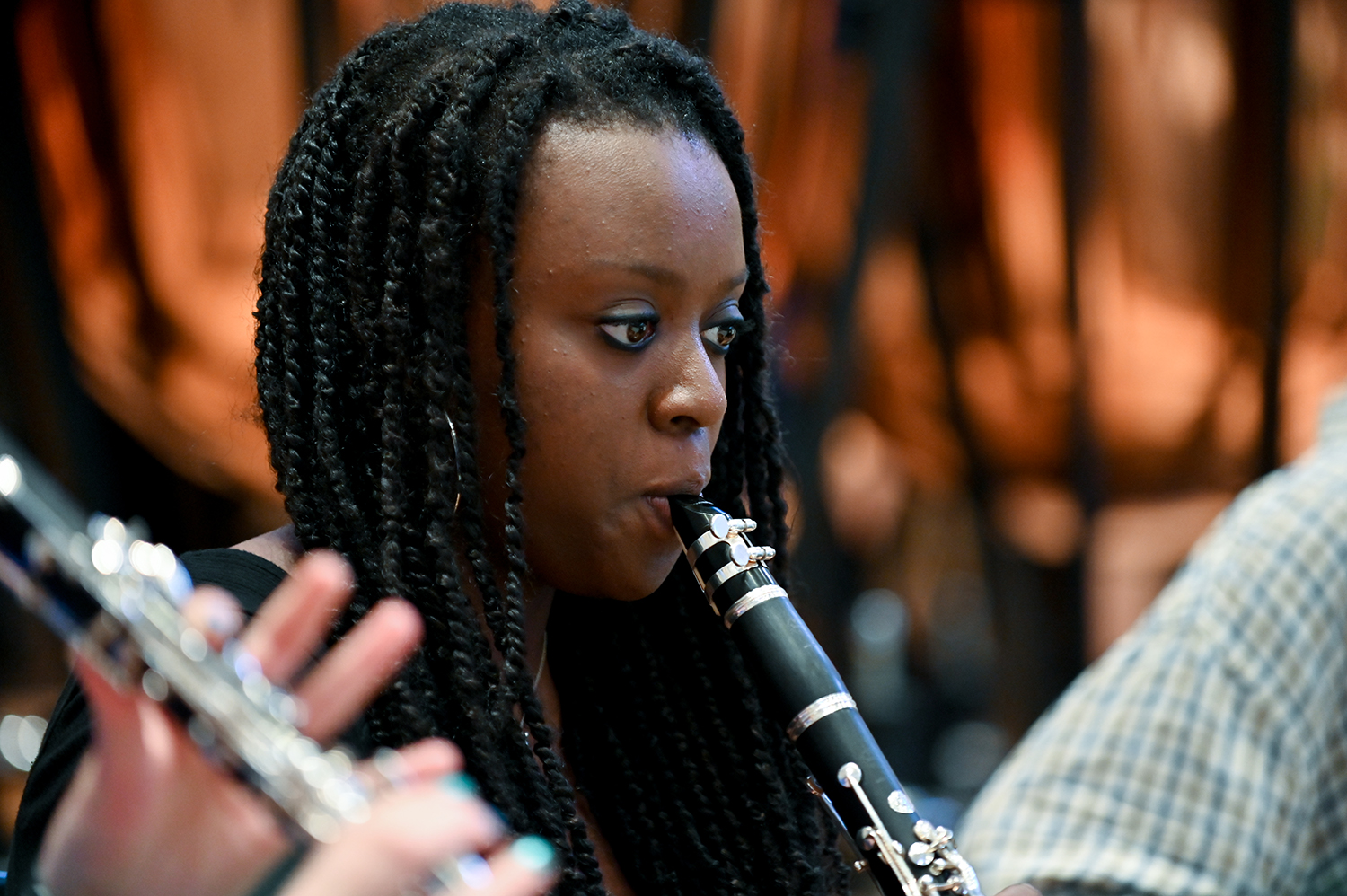 A girl performing on a clarinet